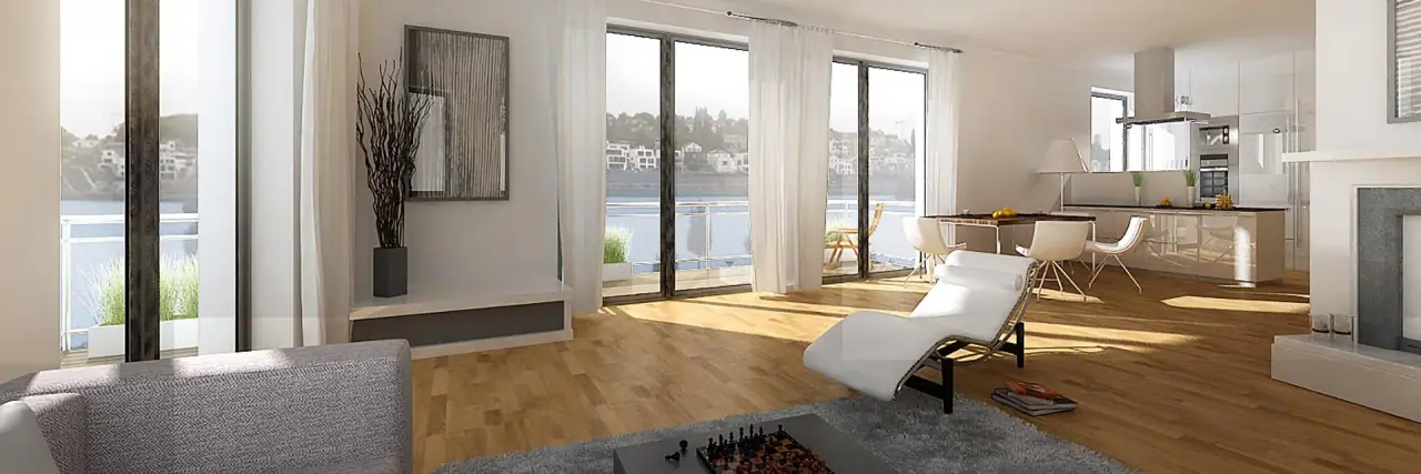 Heller Wohnraum mit bodentiefen Fenstern und Seeblick